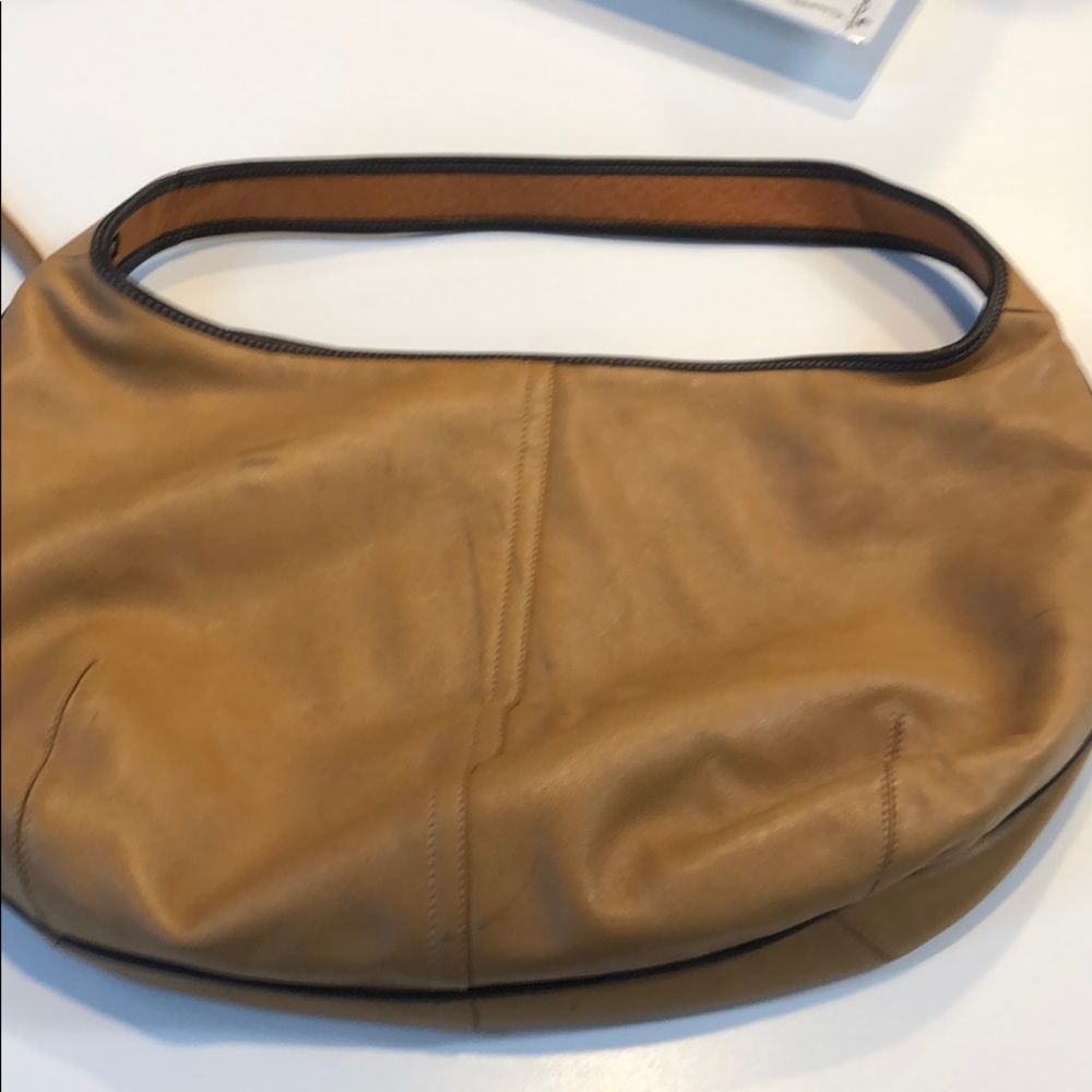 Tan Coach purse